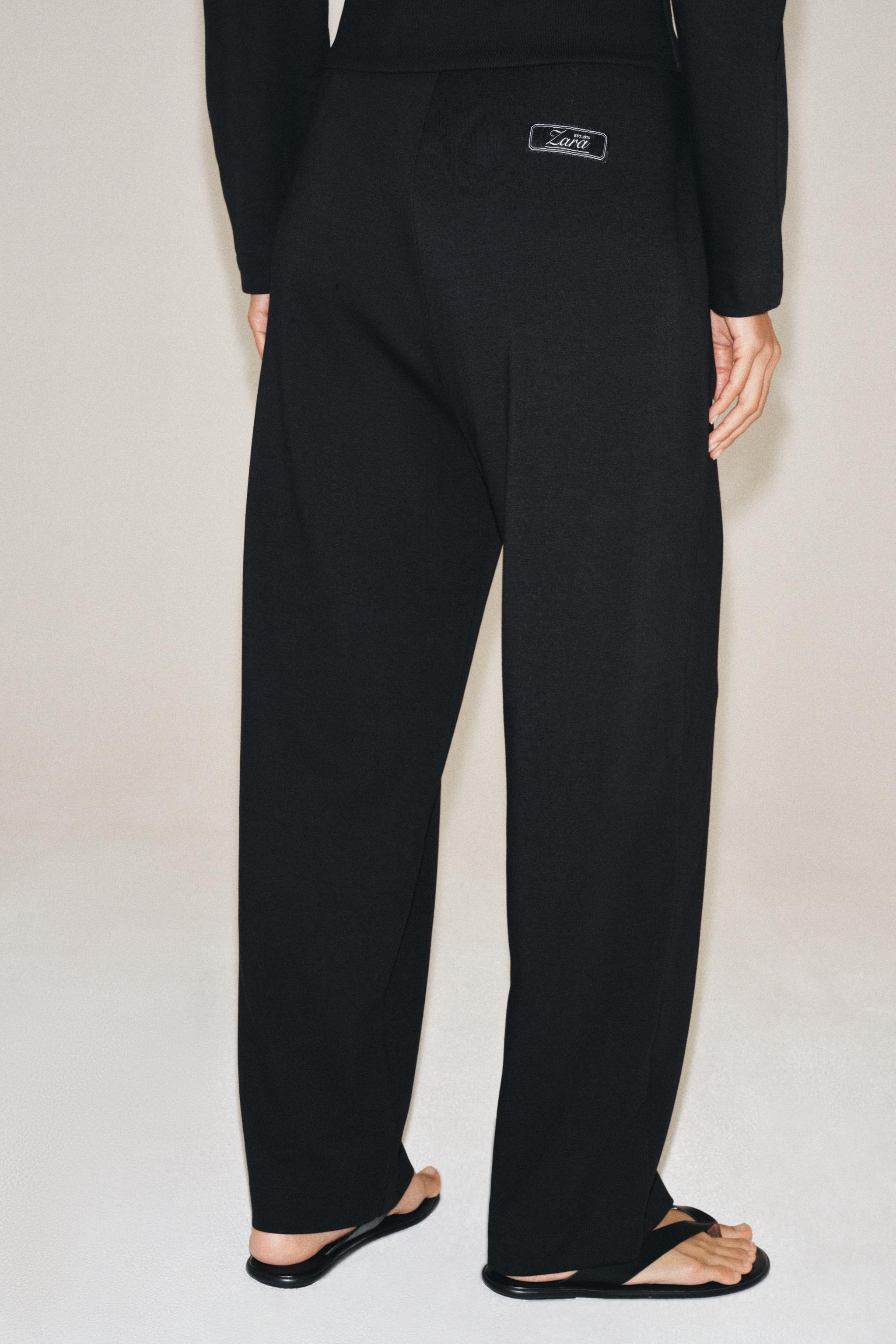 CROPPED WIDE-LEG TROUSERS